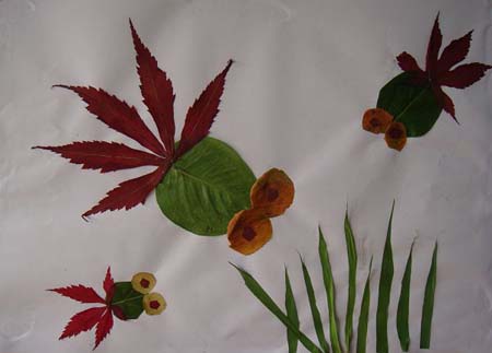 树叶贴画作品:我家鱼缸里的小鱼图片